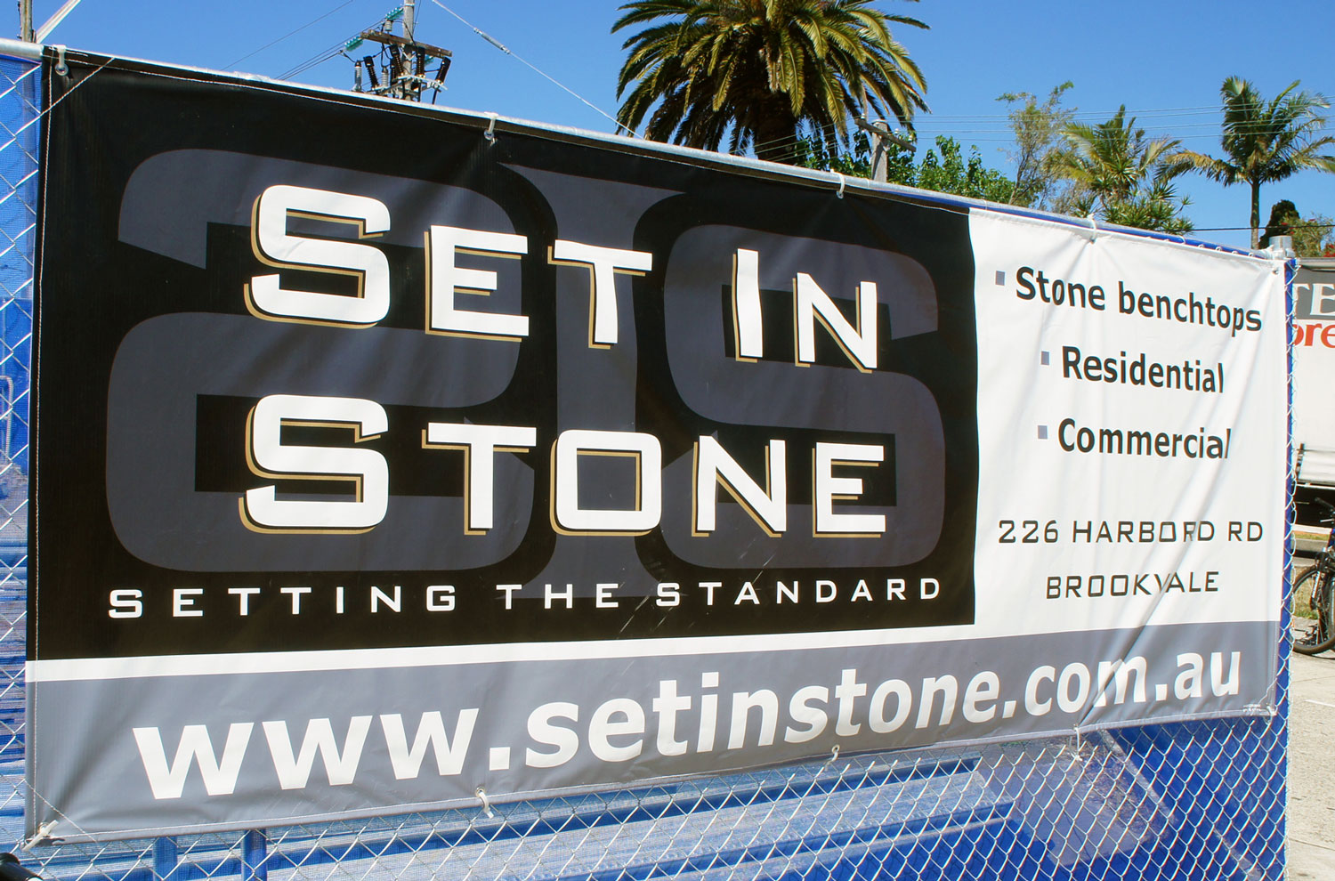 Hybrid Signs, Northern Beaches, Sydney, tear-drop banners signs, MESH BANNERS, VINYL banner signs on construction or fence marketing property or event marketing banners